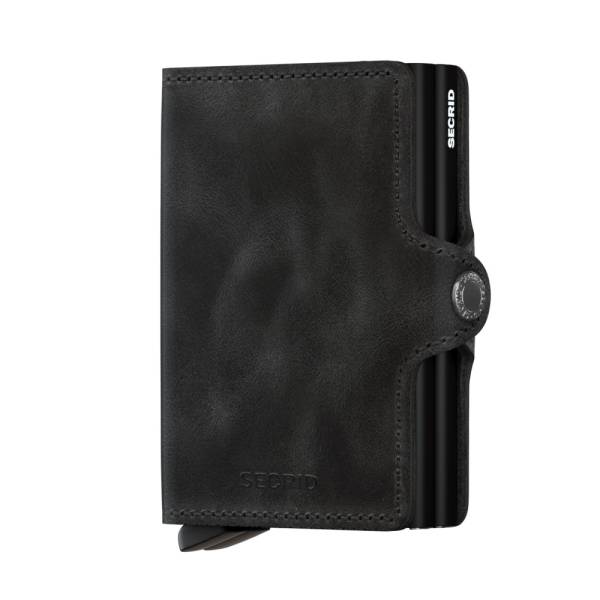 Secrid Twinwallet Vintage Black Twinwallet pojme dvakrát tolik karet díky dvěma integrovaným ochranným schránkám Cardprotector.

prostor na 8 embosovaných nebo 12 hladkých karet
oddíly na další 4 karty či doklady
místo na bankovky či účtenky
patentovaný mechanismus pro snadný přístup
vyrobeno z evropské hovězí usně
opotřebením získá patinu a jedinečný vzhled